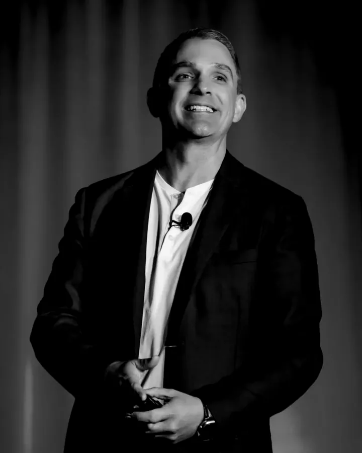 Ryan Deiss speaking on stage